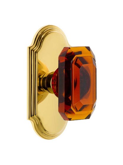 Grandeur Arc Rosette Door Set with Amber Crystal-Glass Baguette Knobs in Polished Brass.